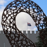 The Australian flag shot through a sculpture at Taylors Wines in the Clare Valley Australia.