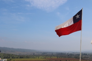 The Chilean Flag waving in the wind at the Indomita winery in the Casablanca Valley in Chile.