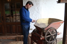 Guy Hooper of Caviahue wines tends antique wine equipment at his home in Maipo Valley in Chile.